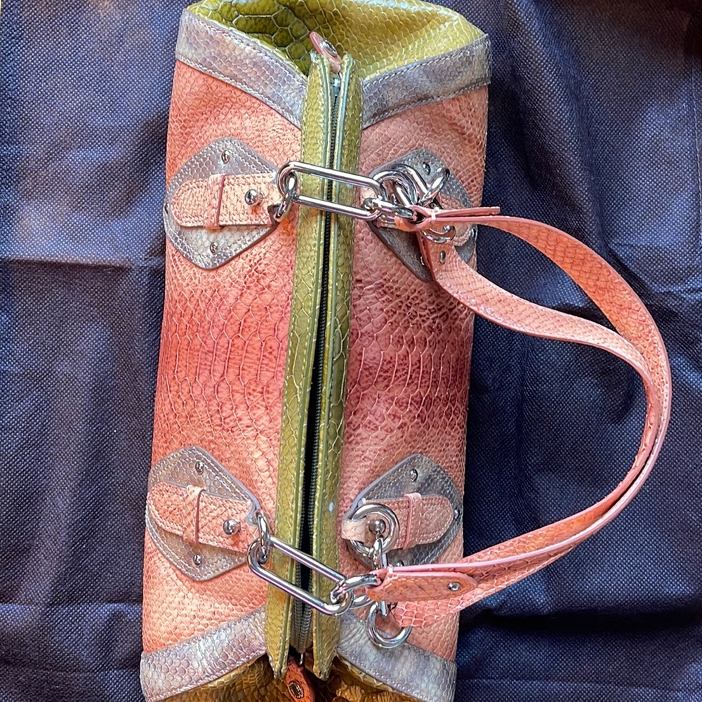 Cole Haan snake skin purse in excellent condition no marks scuffs etc.